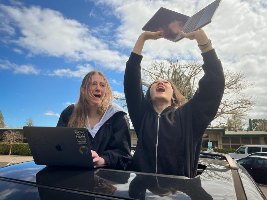 Two panicked Journalism students struggle to find the optimal locations for layout on Pinewoods top-secret WiFi Map.