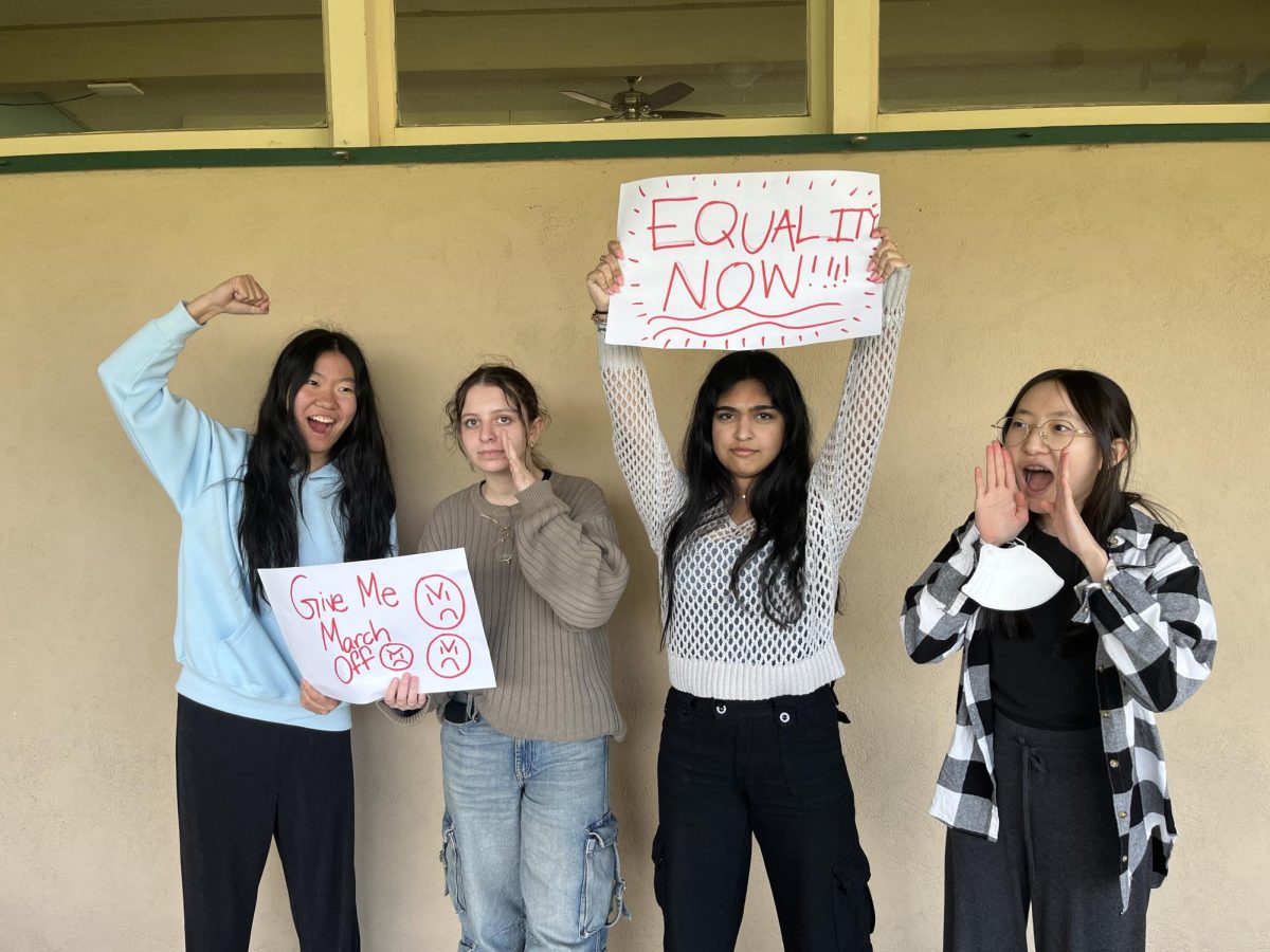 Female students on Upper Campus demand the month of March off.